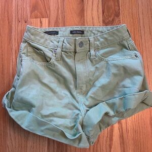Green roll-cuff jean shorts